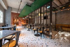 Restorāns vai citas vietas, kur ieturēt maltīti, naktsmītnē Royal Group Hotel Xiong Zhong Branch