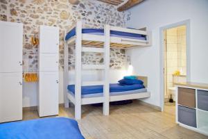 a bedroom with two bunk beds in a room at Oasis in Antibes