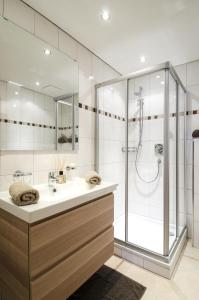 a bathroom with a shower and a sink at Apart Maurice in Galtür
