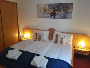 Łóżko lub łóżka w pokoju w obiekcie Alpin Resort Kaprun Top 6