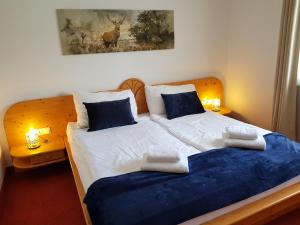 Łóżko lub łóżka w pokoju w obiekcie Alpin Resort Kaprun Top 6