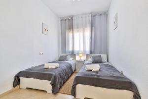 Posteľ alebo postele v izbe v ubytovaní Maison Arlette