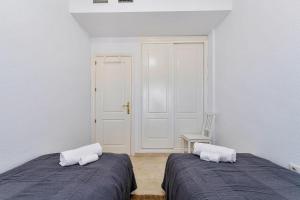 Posteľ alebo postele v izbe v ubytovaní Maison Arlette