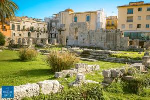 シラクーサにあるDione Apartments by Dimore in Sicily Ortigiaの古代都市遺跡