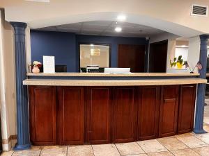 an entrance to an office with a reception counter at SureStay Hotel by Best Western Morganton in Morganton