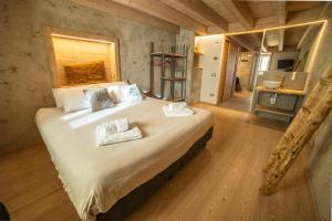 Postel nebo postele na pokoji v ubytování Bazzario B&B