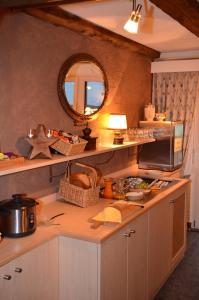 Kuchyň nebo kuchyňský kout v ubytování Hotel Belmont