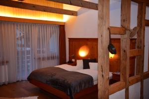 Postel nebo postele na pokoji v ubytování Hotel Belmont + 37 fotografií