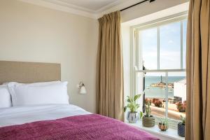 Fort Road Hotel客房内的一张或多张床位