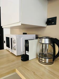 A kitchen or kitchenette at Daisy Homes