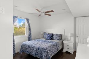 Ένα ή περισσότερα κρεβάτια σε δωμάτιο στο Dune Road House