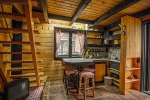 Kuchyň nebo kuchyňský kout v ubytování Zeleni Čardaci etno apartmani