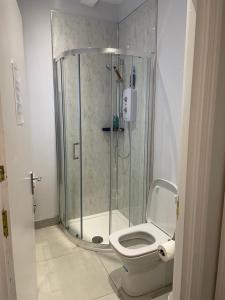 Koupelna v ubytování Harvey Apartments + 6 fotografií