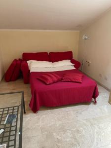 Postel nebo postele na pokoji v ubytování Hotel Poggio Bertino