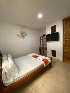 Postel nebo postele na pokoji v ubytování Hotel Paso Realce