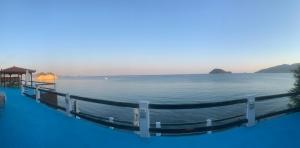 a view of the water from the infinity pool at Villa Mare Zakynthos, private in Laganas