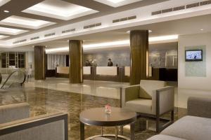 TV a/nebo společenská místnost v ubytování Hotel Santika Premiere Slipi Jakarta