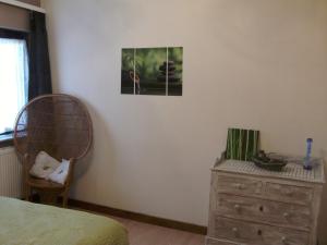 Postel nebo postele na pokoji v ubytování Gîte Les Framboisiers