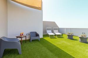 Κήπος έξω από το Hotel Torre Del Sud
