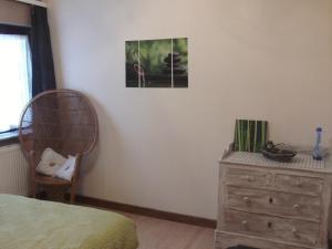 Postel nebo postele na pokoji v ubytování Gîte Les Framboisiers