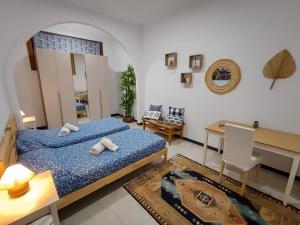 Postel nebo postele na pokoji v ubytování Alma Canaria Rooms