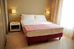 Postel nebo postele na pokoji v ubytování B&B Carini 58