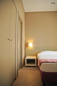Postel nebo postele na pokoji v ubytování B&B Carini 58