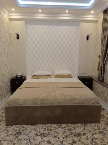Postel nebo postele na pokoji v ubytování Hotel Firuza