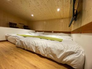 Postel nebo postele na pokoji v ubytování Lemuju B&B Hotel
