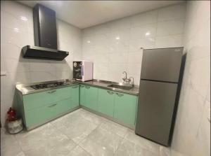 Kuchyň nebo kuchyňský kout v ubytování Lemuju B&B Hotel