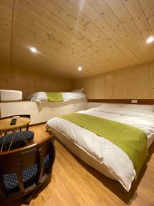 Postel nebo postele na pokoji v ubytování Lemuju B&B Hotel