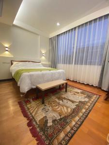 Postel nebo postele na pokoji v ubytování Lemuju B&B Hotel