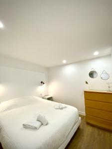 Postel nebo postele na pokoji v ubytování Wonder Appart' -A2- Parking gratuit