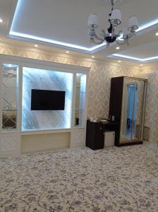 TV a/nebo společenská místnost v ubytování Hotel Firuza