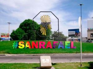 a sign that says santander on the side of a street at San Rafael Ciudad in San Rafael