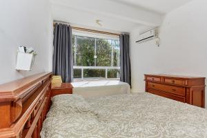 Postel nebo postele na pokoji v ubytování 819 Solar das Bromélias 350 M da Praia Bombinhas Centro + 29 fotografií