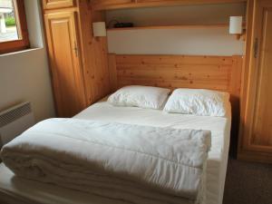 En eller flere senge i et værelse på Appartement Châtel, 2 pièces, 4 personnes - FR-1-200-233