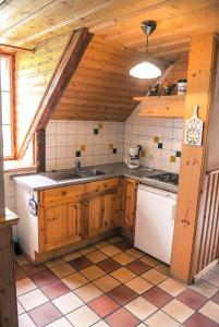 a kitchen with a sink and a counter top at Marx Bauernhaus 