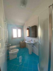 Koupelna v ubytování Sunny Home:Palo del Colle