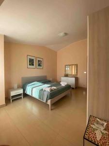 Postel nebo postele na pokoji v ubytování Sunny Home:Palo del Colle
