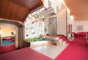 A bed or beds in a room at Albergo Residence Italia Vintage Hotel