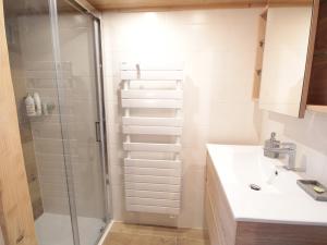 a bathroom with a shower and a sink at Appartement Les Carroz d'Arâches, 3 pièces, 8 personnes - FR-1-572-168 in Les Carroz d'Araches