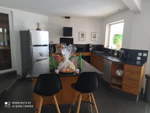 Kuchyň nebo kuchyňský kout v ubytování Villa spa Grand Anse