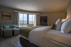 Postel nebo postele na pokoji v ubytování Comfort Inn & Suites Tobago + 37 fotografií