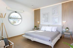 Postel nebo postele na pokoji v ubytování Ensuite Deluxe Jacuzzi & Parking Privado