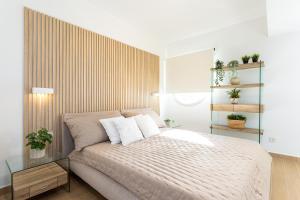 Postel nebo postele na pokoji v ubytování Ensuite Deluxe Jacuzzi & Parking Privado