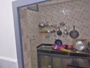 a kitchen with a sink and a counter top at لبلازا la plaza in Laayoune