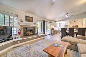 a living room with a couch and a fireplace at Modern Tahoe City Home Close to Beaches! in Tahoe City