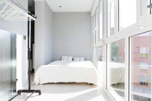 Katil atau katil-katil dalam bilik di LOFT EXCLUSIVO EN EL CENTRO