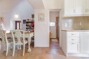 Fotografie z fotogalerie ubytování LiLy's Garden House v destinaci Ágios Rókkos